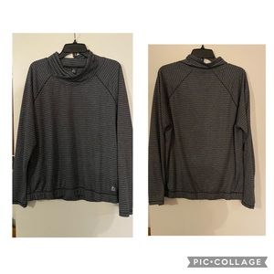 Reebok long sleeve sweater is junior size XL